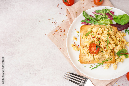 Plate with tasty scrambled ...