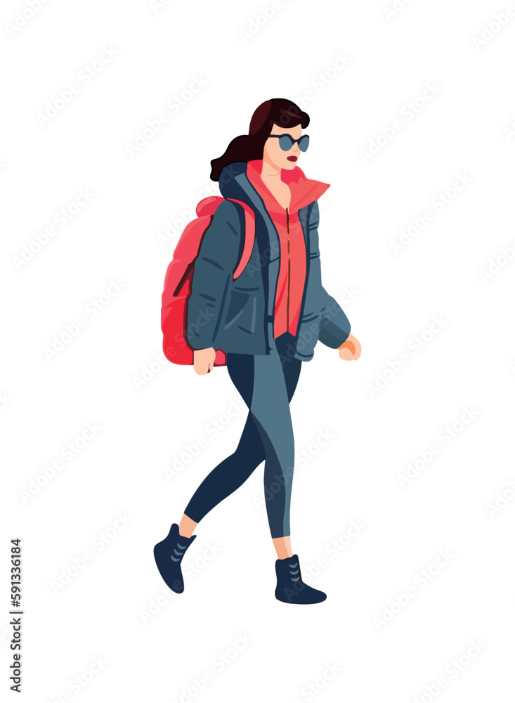 Smiling young woman walking