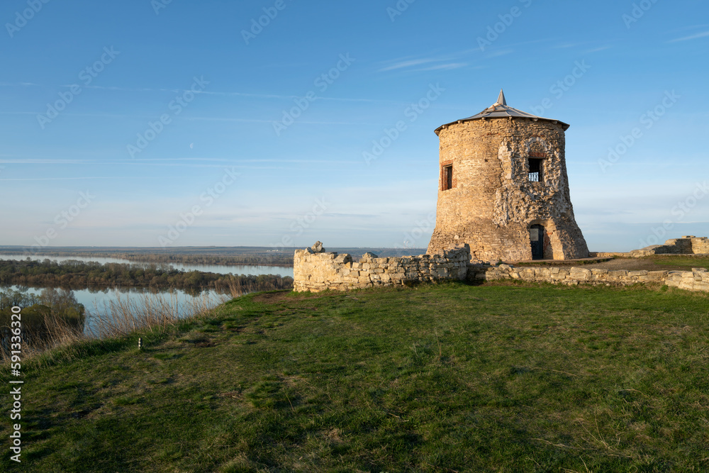 View of the remains of a fortified settlement on the bank of the Kama River - a white stone tower on the Yelabuga (Devil's) settlement on a sunny summer day, Yelabuga, Republic of Tatarstan, Russia