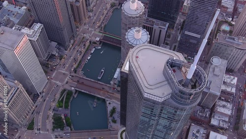 A rolling time lapse overlooking the chicago river with an amazing sunset view of the city of chicago inner loop district. photo