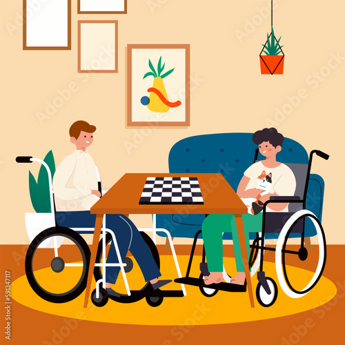 Two disabled men in wheelchair enjoy to play chess together in the living room at home