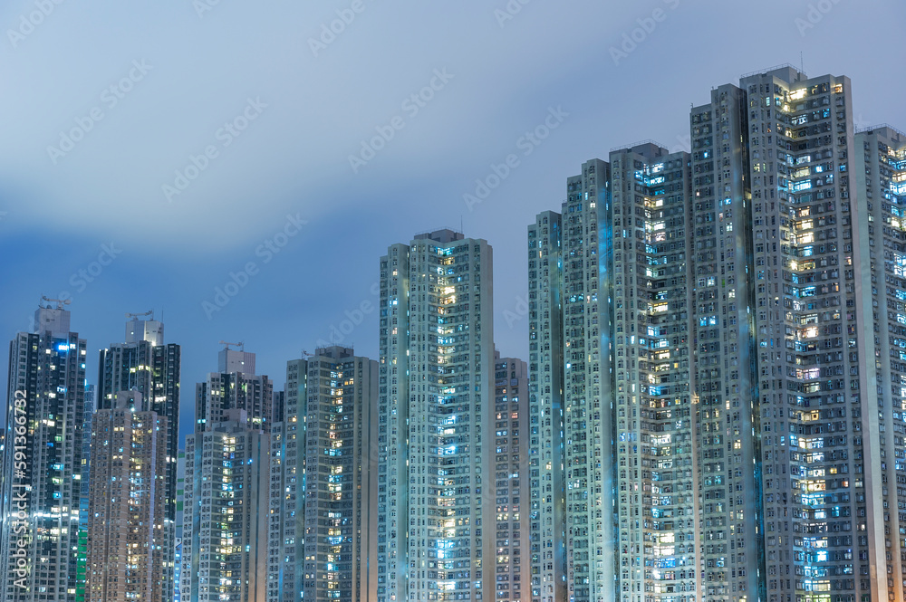 High rise residential building in Hong Kong city at night