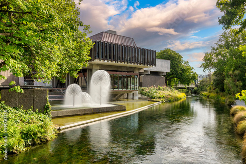 Christchurch Town Hall, the Ferrier Fountain and the Avon River, New Zealand photo