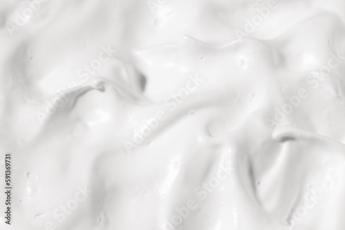 Texture of white cosmetic cream macro, top view. Beauty product for skin care.