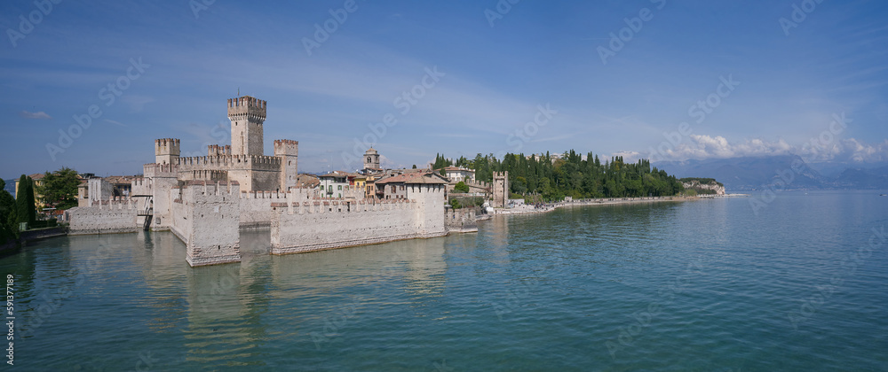 Panoramic aerial view to the town of Sirmione, Scaligero Castle, popular travel destination on Lake Garda in Italy