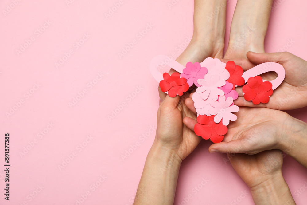 Women's health and women's healthcare concept with uterus Women's health and women's healthcare concept with uterus
