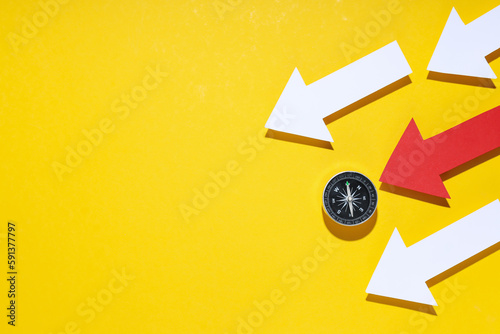 Business navigate concept with compass and arrows