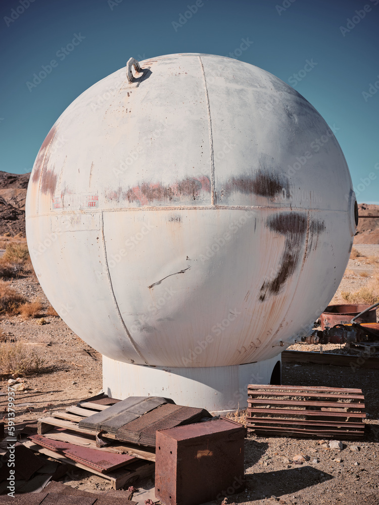 Spherical metal underground fuel storage container