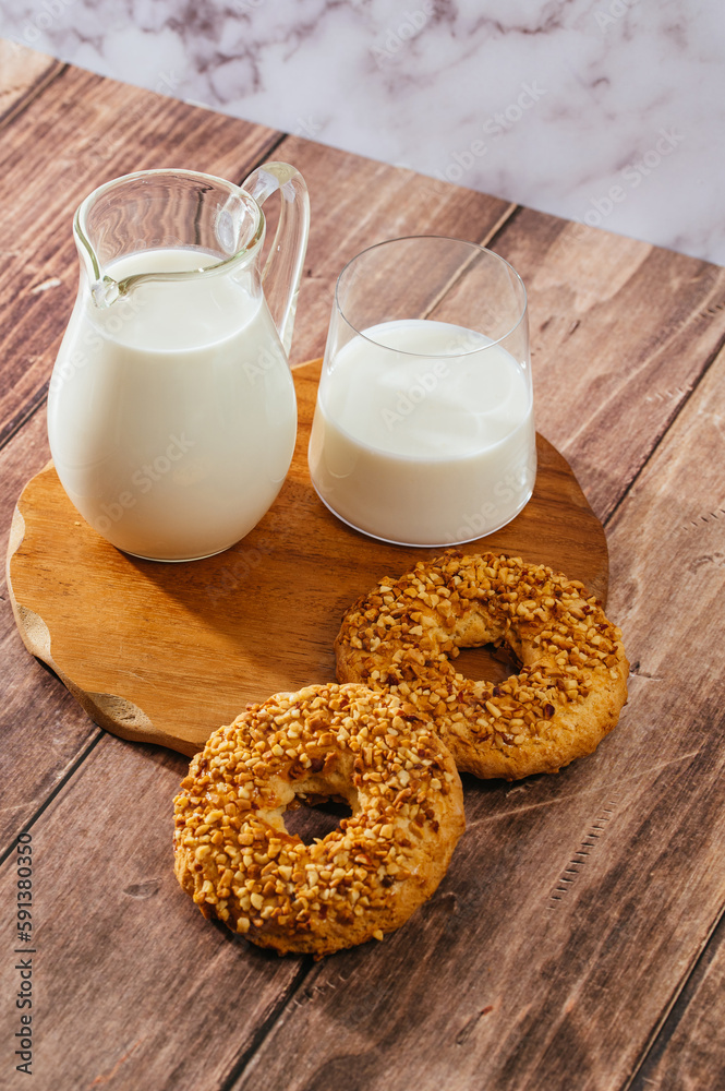 cookies with peanuts, milk in a glass cookies with peanuts, milk in a glass