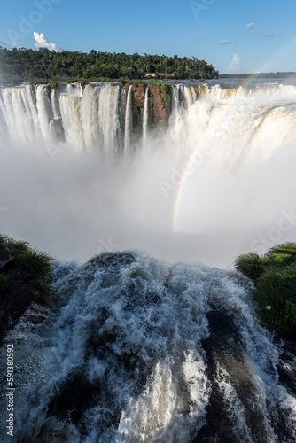 Beautiful view to Iguazu Falls waterfalls with rainbow