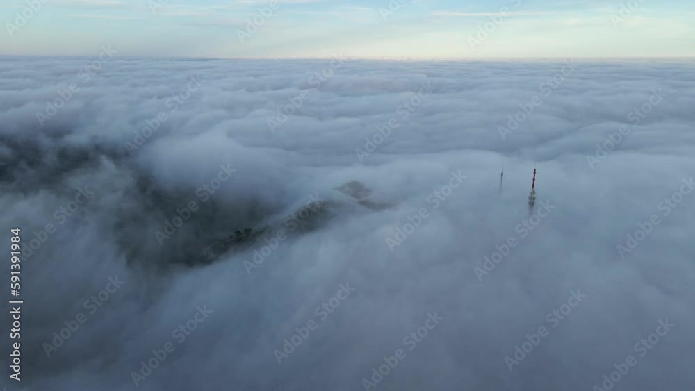 Clouds cover the valley in Spain with Monte Toro hiding beneath. Drone panning around viewpoint. Clouds cover the valley in Spain with Monte Toro hiding beneath. Drone panning around viewpoint.