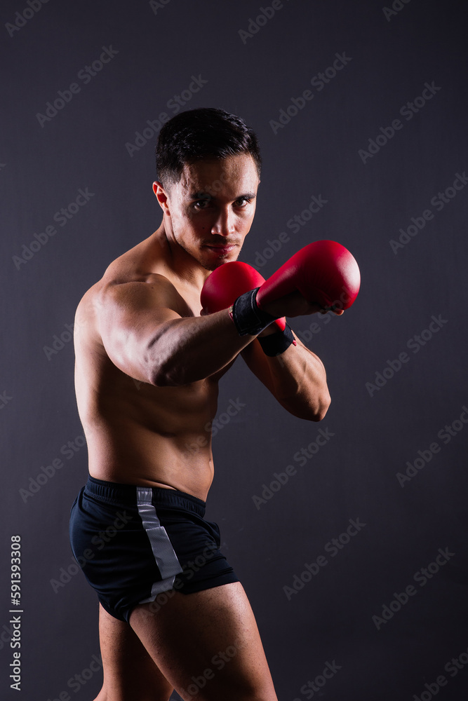 Training, young man and boxer with boxing gloves for competition, prepare for match