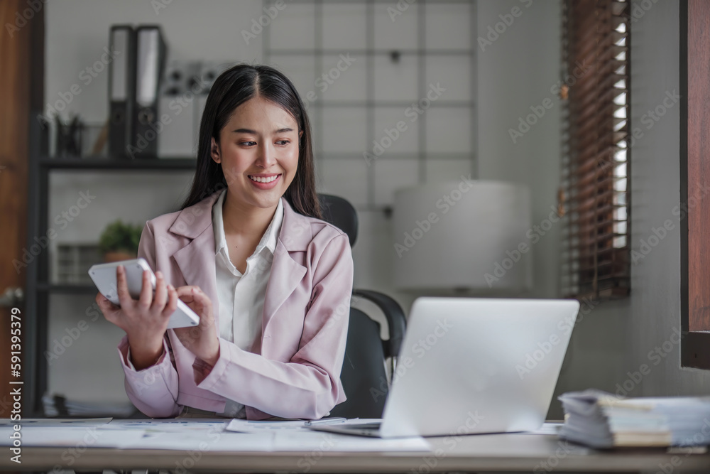 Business woman using calculator for do math finance on wooden desk in office and business working background, tax, accounting, statistics and analytic research concept.. Business woman using calculator for do math finance on wooden desk in office and business working background, tax, accounting, statistics and analytic research concept..