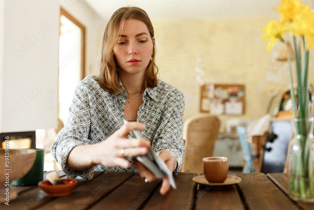 Card game as support for metaphorical representations, systemic Therapy. Psychologist woman having session with metaphorical associative cards..