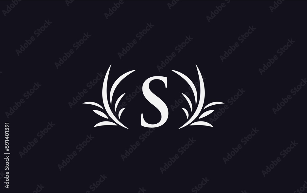Golden laurel wreath leaf logo design vector with the letters and alphabets and bamboo leaf Golden laurel wreath leaf logo design vector with the letters and alphabets and bamboo leaf