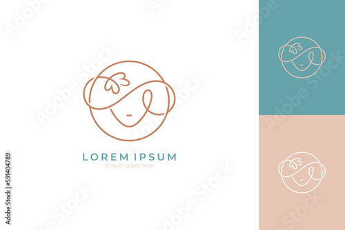 Logo of beautiful woman wearing hat with flower decoration