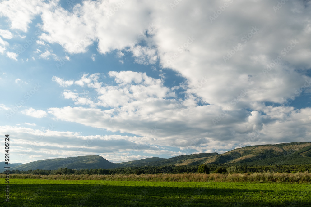 landscape with mountains and clouds landscape with mountains and clouds