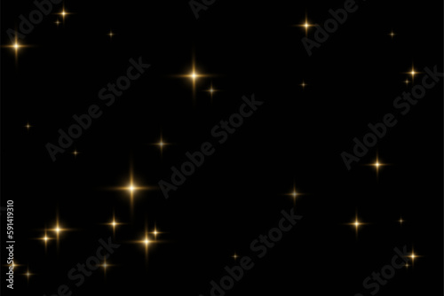 Golden glitter.Light effect.Glittering particles background. Gold dust on a transparent background.