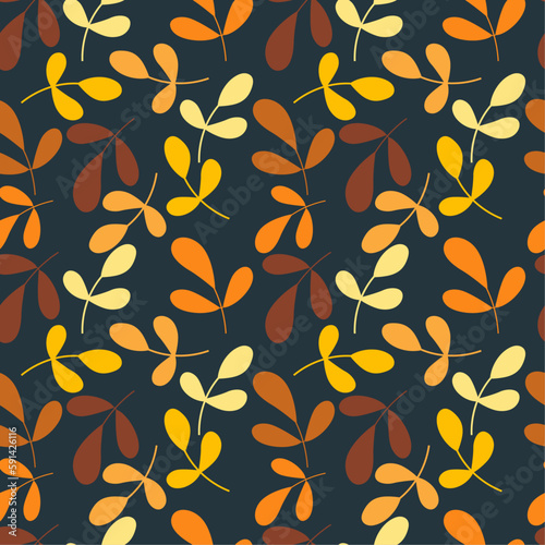 Seamless pattern with leaves and twigs. Autumn palette