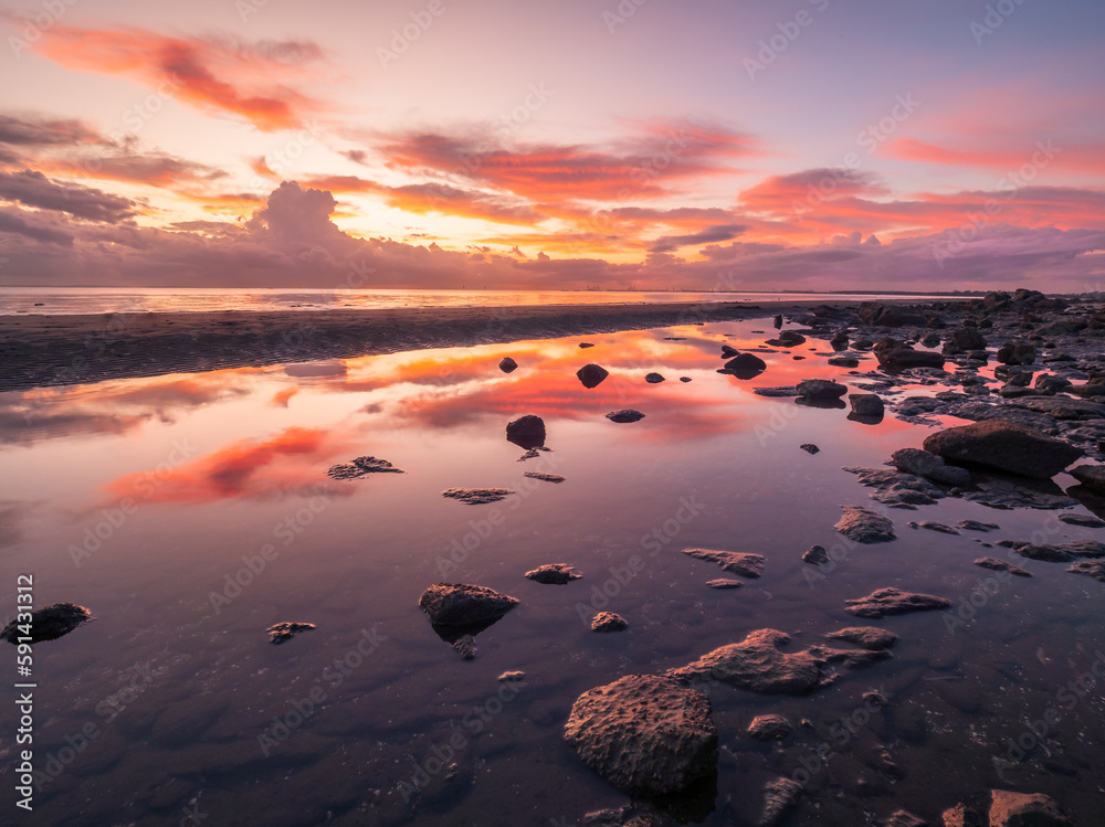 Sunrise By The Sea with Cloud Reflections