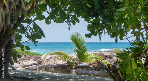 Turquoise water in Anse Kerlan beach photo