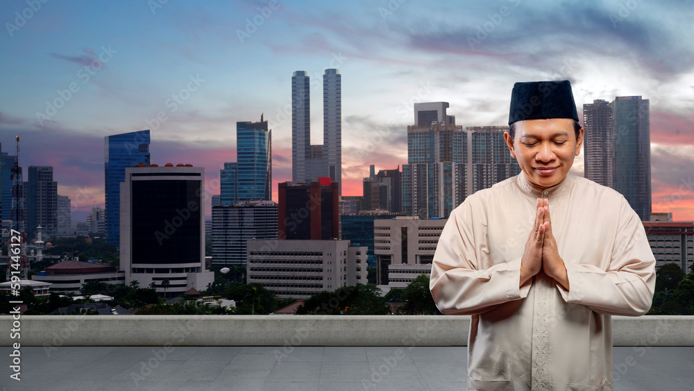 Asian Muslim man with greeting gesture Asian Muslim man with greeting gesture