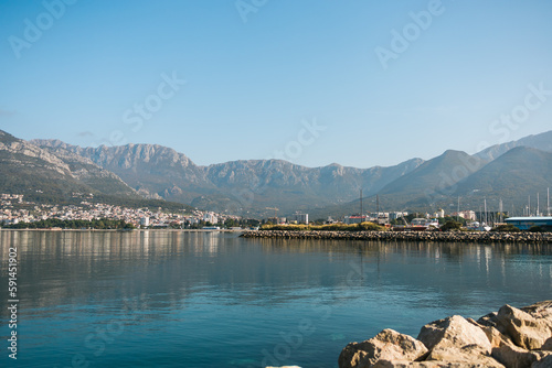 Adriatic sea shore panoramic landscape in perfect summer day. Awesome transparent water and mountain background. Bar, Montenegro © satura_
