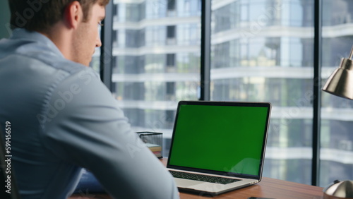 Confident entrepreneur mockup laptop video call in office. Job interview concept