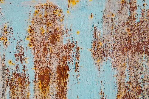 Old cracked paint in craquelure on a rusty metal surface Grunge rusted metal texture. Rusty corrosion and oxidized background. Worn metallic iron rusty metal background