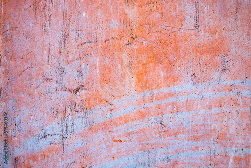 Old cracked paint in craquelure on a rusty metal surfaceGrunge rusted metal texture. Rusty corrosion and oxidized background. Worn metallic iron rusty metal background. 