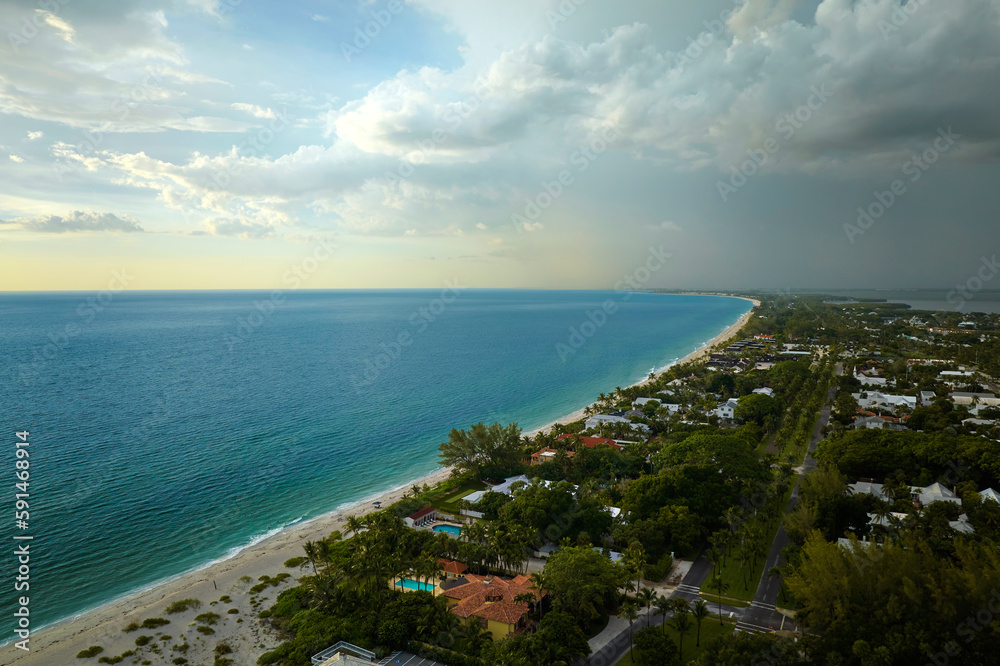Aerial view of rich neighborhood with expensive vacation homes in Boca Grande, small town on Gasparilla Island in southwest Florida. American dream homes as example of real estate development in US