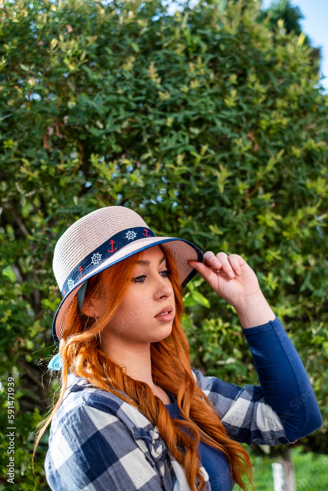 Young Woman in a Hat, Looking at Tree