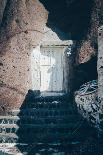 Old doorway into caves, Fira Old Port, Santorini