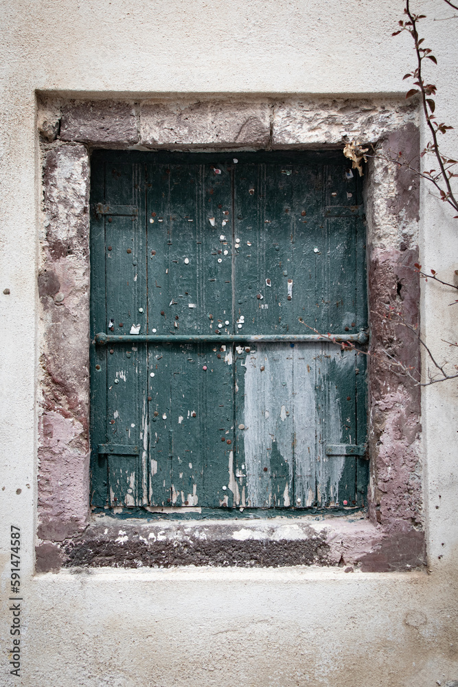 Old boarded up window, Fira, Santorini Old boarded up window, Fira, Santorini