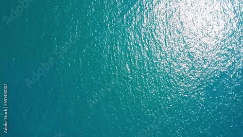 4k aerial view of the ocean sea in america drone clip tuquoise water calm waves summer holidays sunny day beach photo