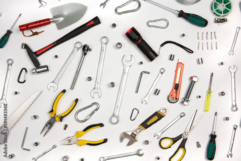 Set of tools for repair in a case on a white background. Assorted work or construction tools. Wrenches, Pliers, screwdriver. Top view Set of tools for repair in a case on a white background. Assorted work or construction tools. Wrenches, Pliers, screwdriver. Top view