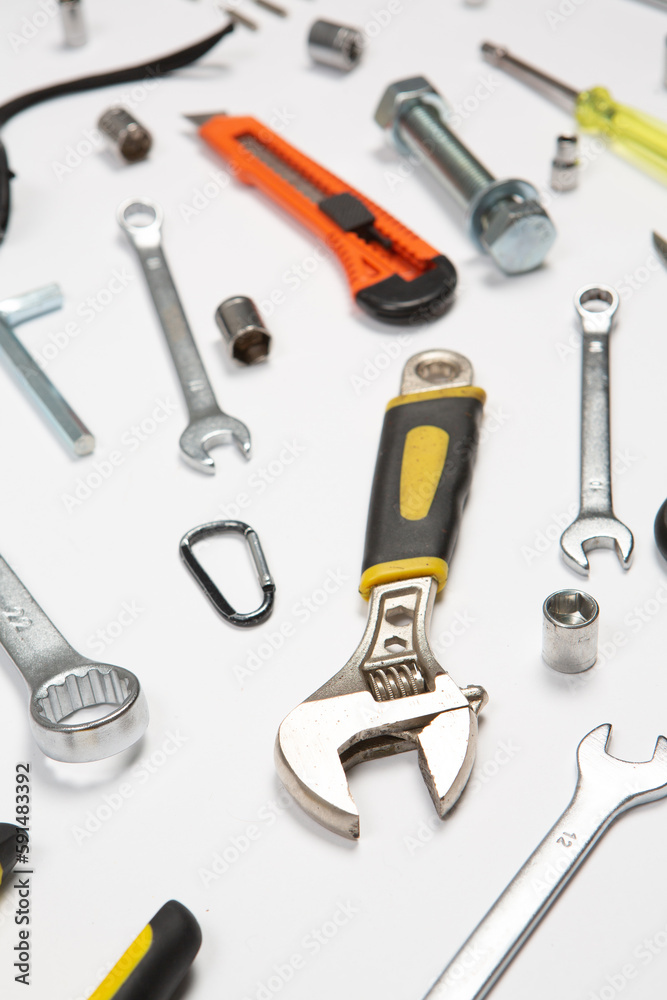 Set of tools for repair in a case on a white background. Assorted work or construction tools. Wrenches, Pliers, screwdriver. Top view Set of tools for repair in a case on a white background. Assorted work or construction tools. Wrenches, Pliers, screwdriver. Top view