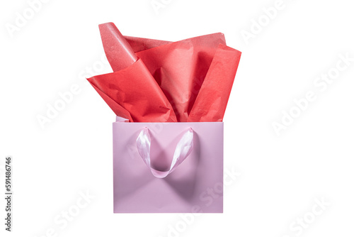Craft paper gift bag with tissue paper isolated on a white background