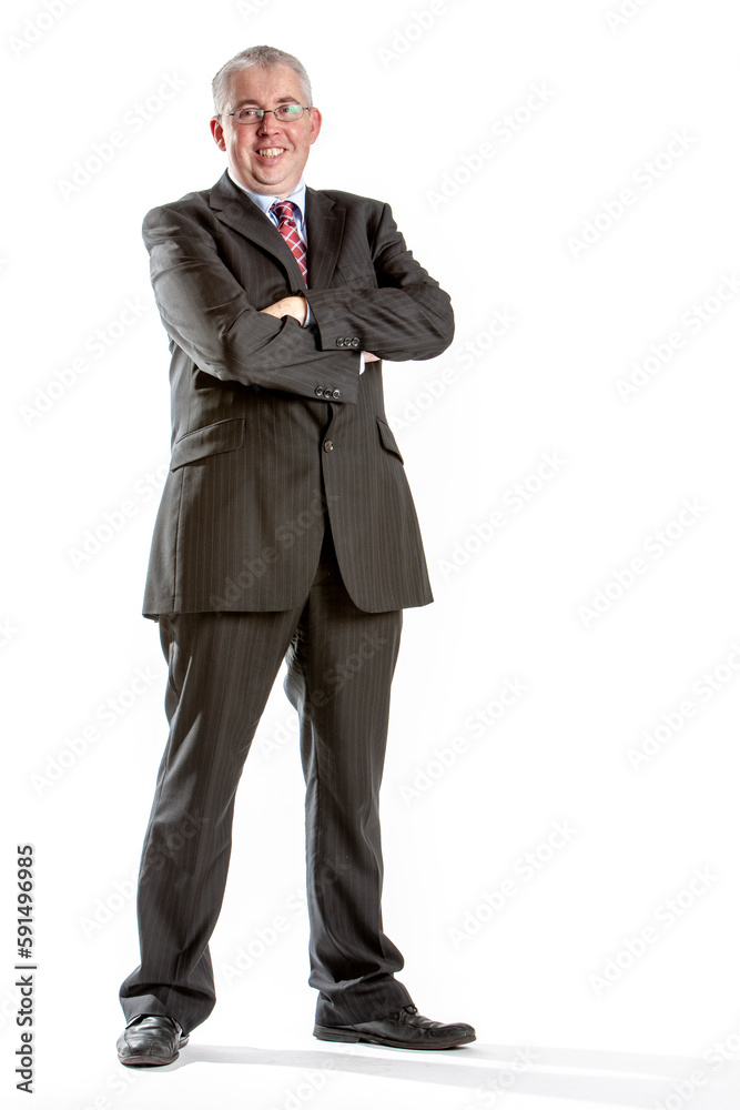 Business Colleagues: Confident Man. Full length portrait of a friendly male office professional isolated on white. From a series of related images.