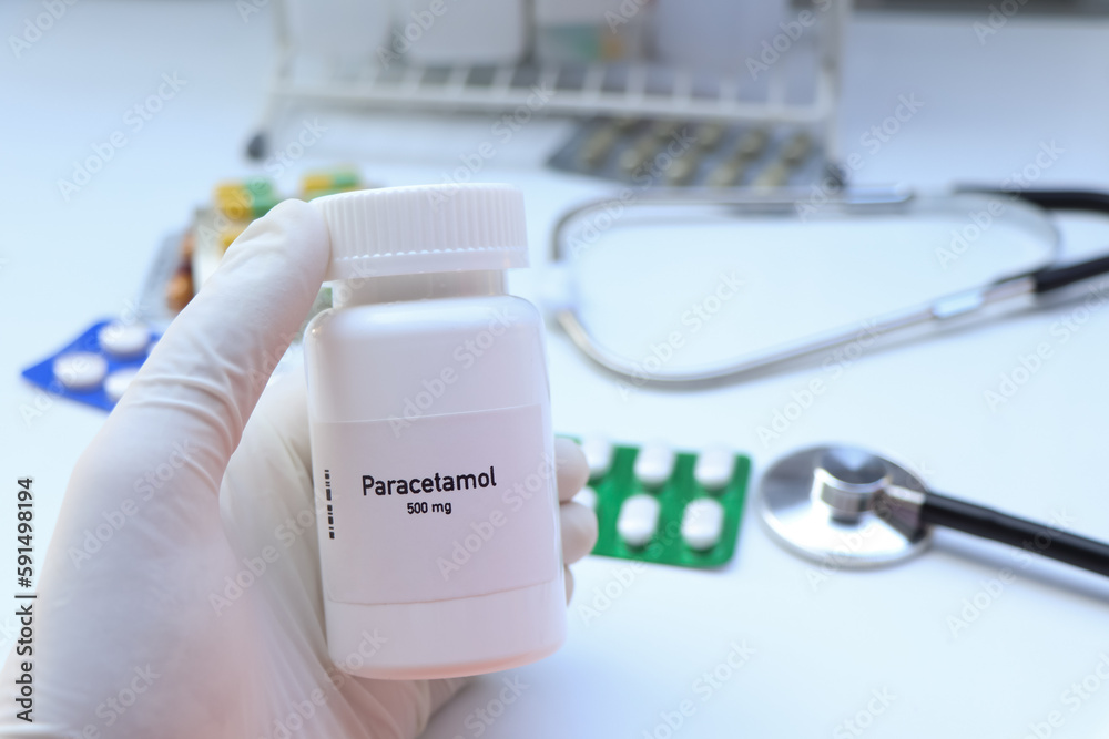 Paracetamol pill in white bottle, pill stock