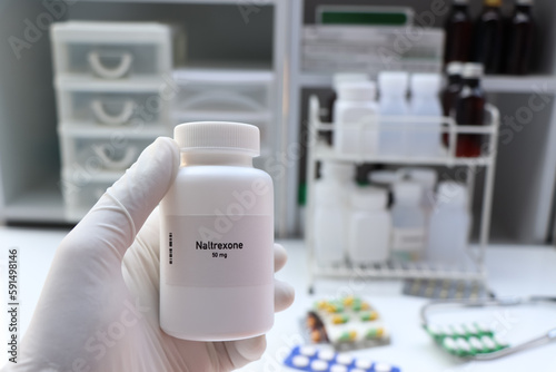 Naltrexone pill in white bottle, pill stock