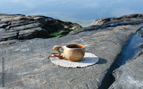 Morning coffee on rocky island in the archipelago