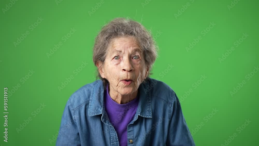 Portrait of pensive elderly senior old woman with wrinkled skin and grey hair with anticipating success but ends in failure isolated on green screen background studio Portrait of pensive elderly senior old woman with wrinkled skin and grey hair with anticipating success but ends in failure isolated on green screen background studio