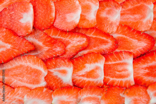 Fresh ripe strawberry pattern. Texture of sliced strawberries.