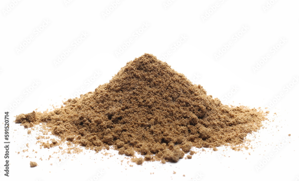Coriander powder pile isolated on white background, side view Coriander powder pile isolated on white background, side view