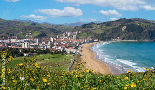 aerial view of Zarautz, beautiful Basque city at the Bay of Biscay with its famous golden sand beach, Basque Country, Spain