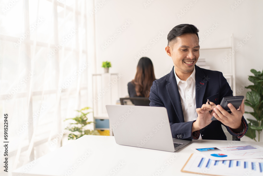 The couple of business talking about the project and make deal in the office. The couple of business talking about the project and make deal in the office.
