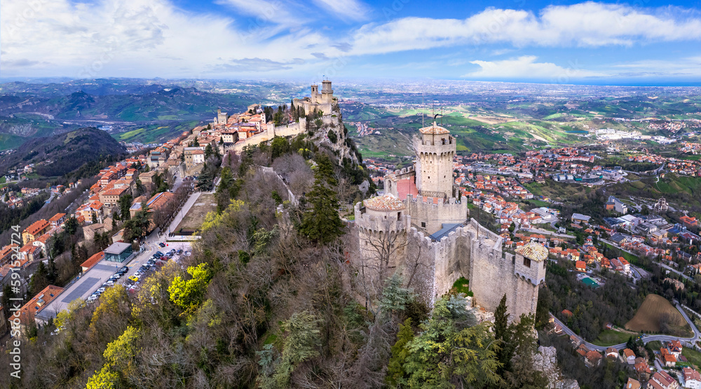 San Marino aerial drone panoramic view of medieval town and two castles. Italy travel and landmarks