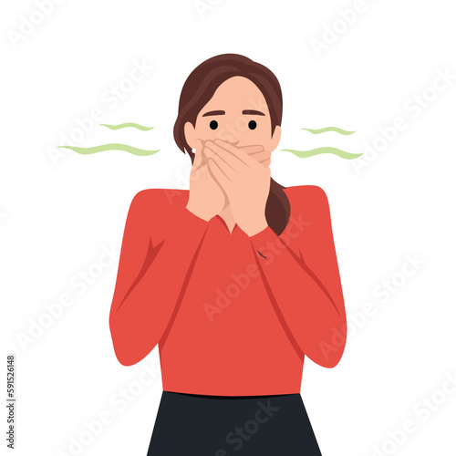 Young teenager girl pinching her nose bad stinking bad smell concept