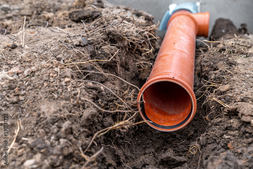 Wallpaper Mural plastic pvc waste sewer pipe in the ground. construction site Torontodigital.ca